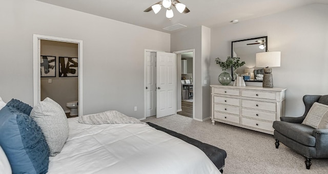 310 Bandit Cove Ct, Crosby, TX 77354 - bedroom featuring light colored carpet, ceiling fan, ensuite bathroom, and baseboards