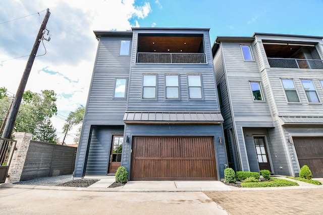 11028 Avenu Malkenu Ave, Houston, TX 77043 - view of property featuring driveway and a garage