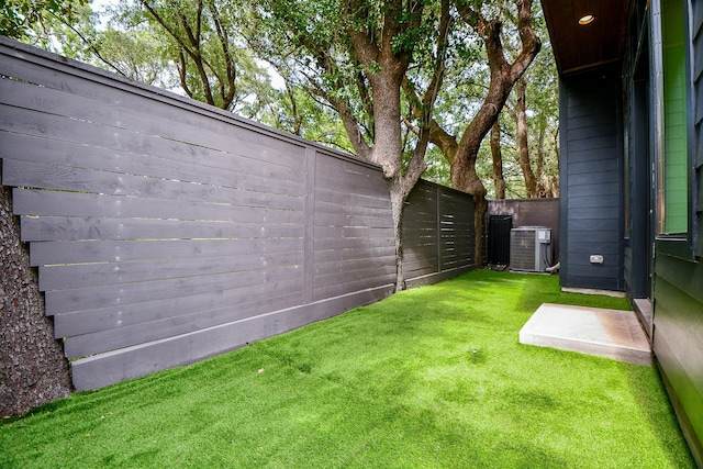 11028 Avenu Malkenu Ave, Houston, TX 77043 - view of yard with central AC unit