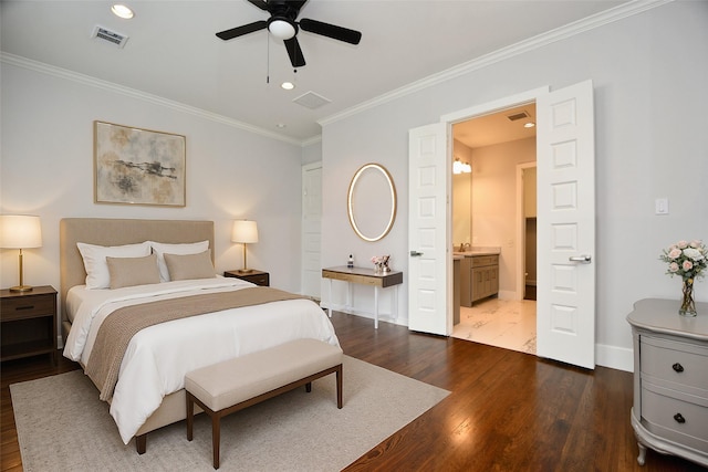 11028 Avenu Malkenu Ave, Houston, TX 77043 - bedroom featuring crown molding, dark wood finished floors, baseboards, recessed lighting, and ensuite bathroom