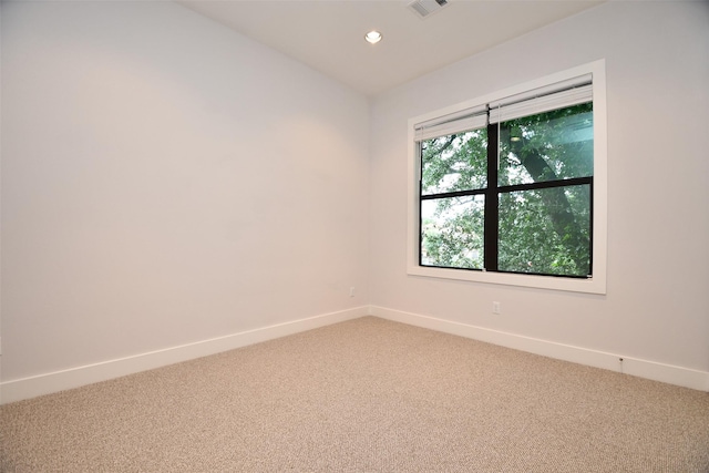 11028 Avenu Malkenu Ave, Houston, TX 77043 - spare room with light carpet, baseboards, and recessed lighting