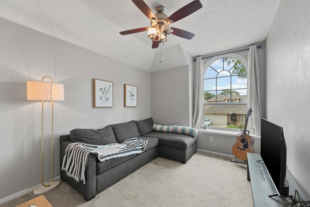 8515 Cold Lake Dr, Houston, TX 77088 - living room featuring carpet floors, a ceiling fan, and baseboards