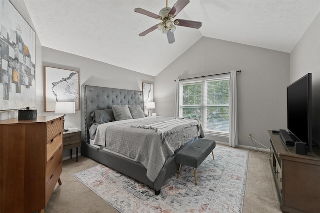 8515 Cold Lake Dr, Houston, TX 77088 - bedroom with light colored carpet, lofted ceiling, ceiling fan, and baseboards