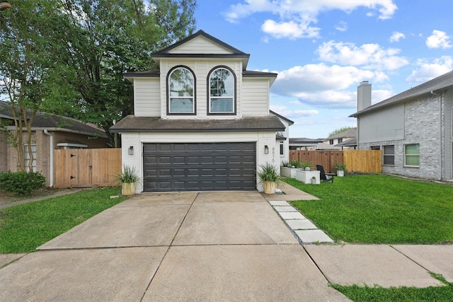8515 Cold Lake Dr, Houston, TX 77088 - traditional home with an attached garage, driveway, and a gate