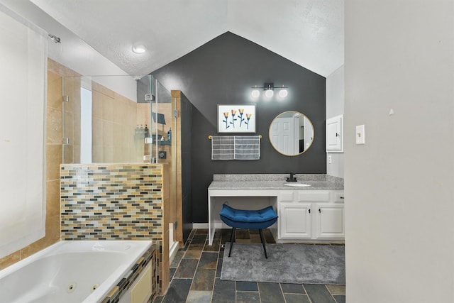 8515 Cold Lake Dr, Houston, TX 77088 - full bathroom with a stall shower, a tub with jets, vanity, stone finish flooring, and baseboards