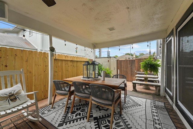 8515 Cold Lake Dr, Houston, TX 77088 - sunroom / solarium featuring outdoor dining area