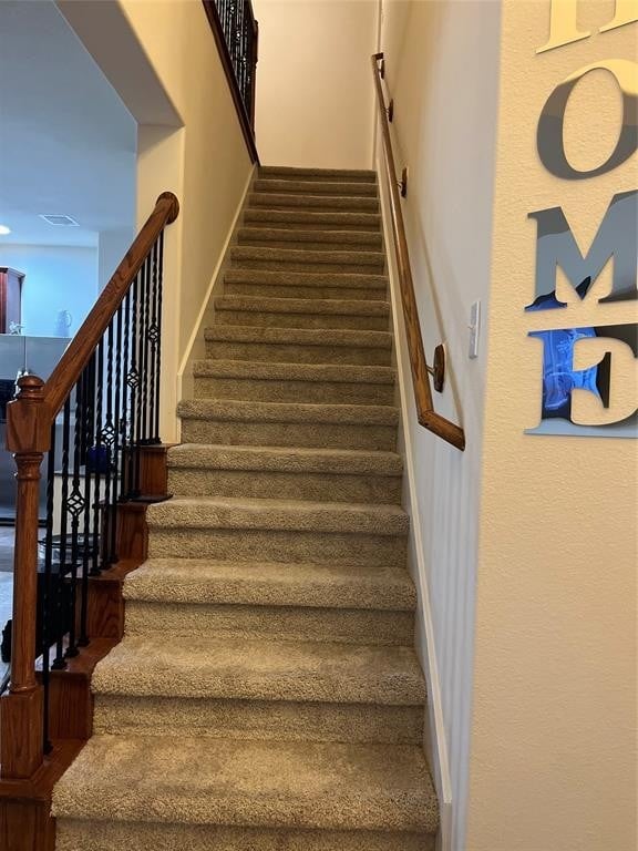 14226 Silver Hollow Ln, Houston, TX 77082 - stairway featuring carpet flooring and baseboards
