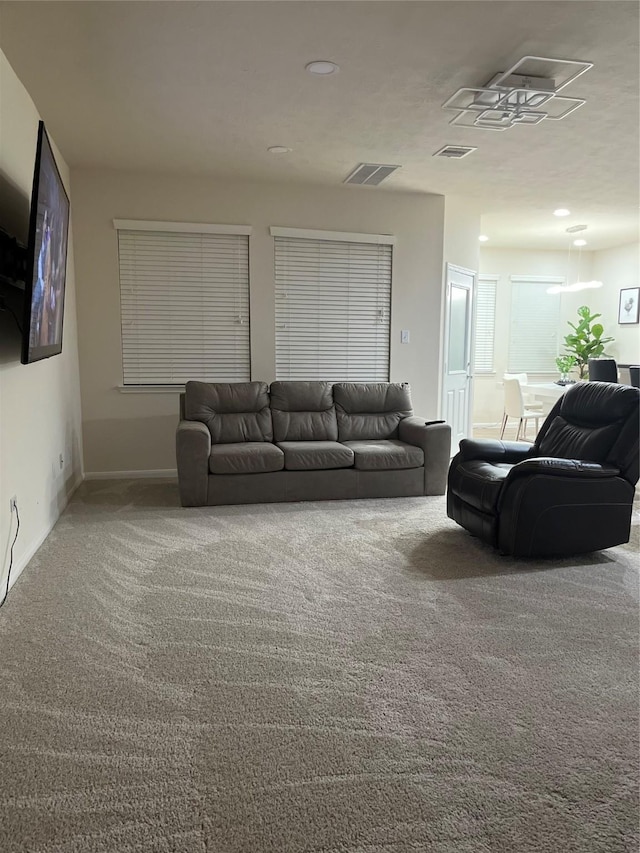 14226 Silver Hollow Ln, Houston, TX 77082 - living room featuring carpet floors, baseboards, and recessed lighting