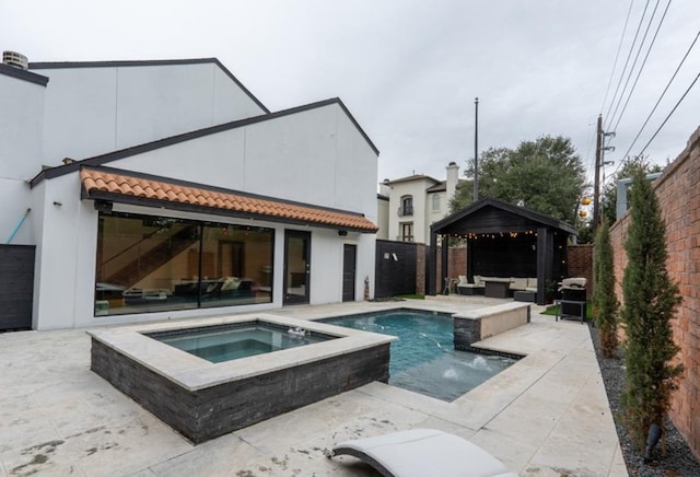 1001 Potomac Dr, Houston, TX 77057 - view of swimming pool with a gazebo, a patio area, a fenced backyard, and a pool with connected hot tub