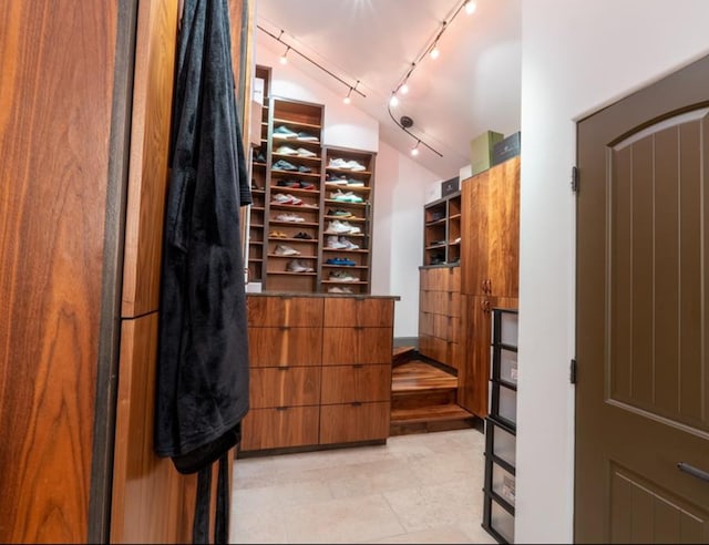 1001 Potomac Dr, Houston, TX 77057 - wine room with rail lighting and lofted ceiling