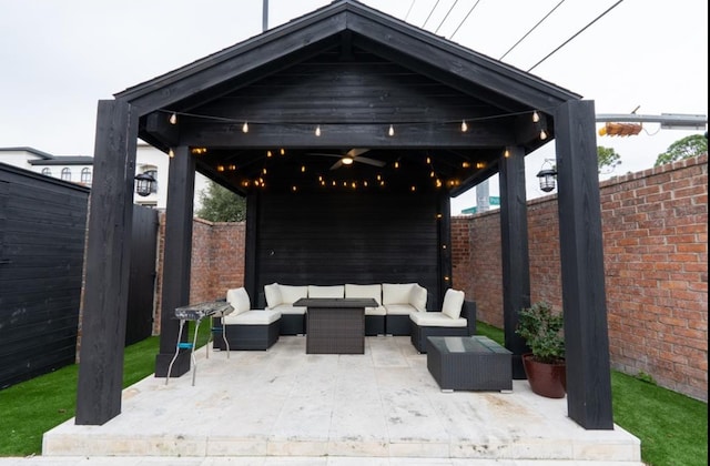 1001 Potomac Dr, Houston, TX 77057 - fenced backyard featuring an outdoor living space and a patio area
