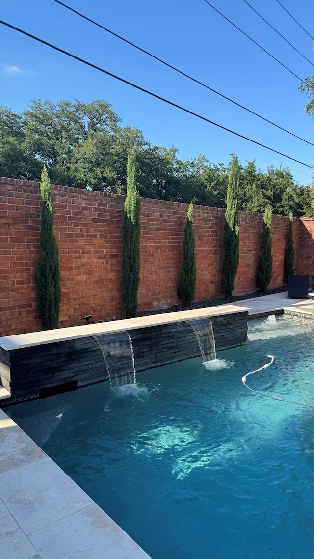 1001 Potomac Dr, Houston, TX 77057 - view of pool with a fenced backyard