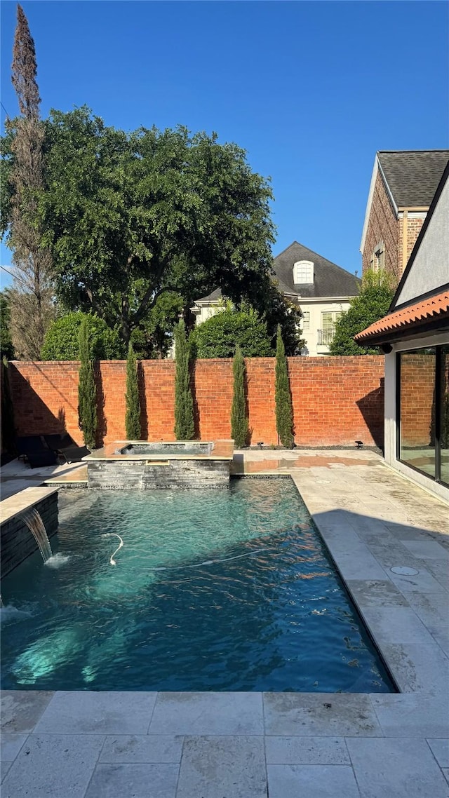 1001 Potomac Dr, Houston, TX 77057 - view of pool with a fenced backyard, an in-ground hot tub, and a patio