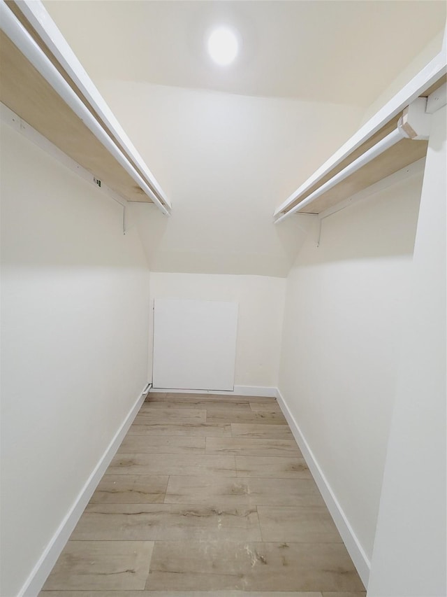 9926 Tangiers Rd, Houston, TX 77041 - spacious closet featuring light wood-style flooring