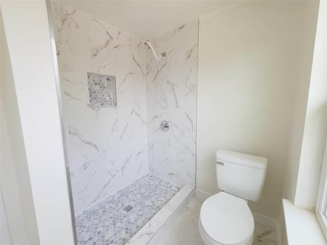9926 Tangiers Rd, Houston, TX 77041 - bathroom with marble finish floors, a marble finish shower, and toilet