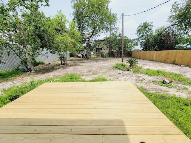 9926 Tangiers Rd, Houston, TX 77041 - wooden terrace featuring a fenced backyard