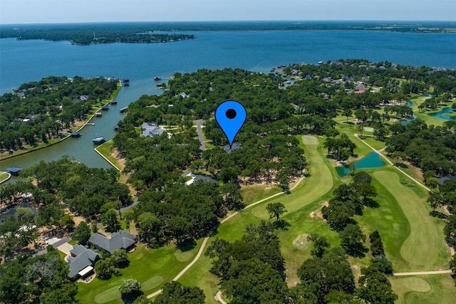 167 Saint Andrews Dr E, Mabank, TX 75156 - aerial view of property's location with a nearby body of water, a golf club, nearby suburban area, and a tree filled landscape