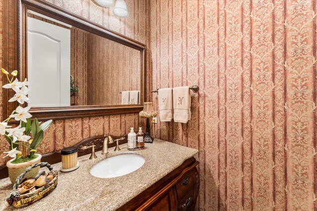 167 Saint Andrews Dr E, Mabank, TX 75156 - bathroom featuring wallpapered walls and vanity