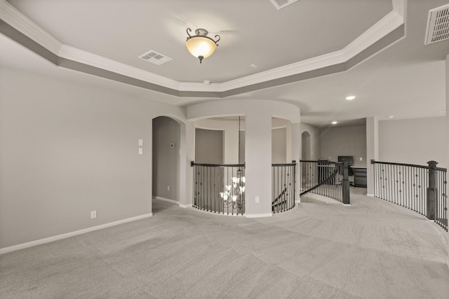 17006 Shannon Lake Ct, Houston, TX 77044 - carpeted spare room with a tray ceiling, arched walkways, ornamental molding, baseboards, and recessed lighting