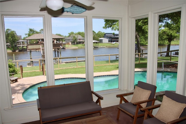 323 E County Road 461b, Brazoria, TX 77422 - sunroom / solarium with a water view