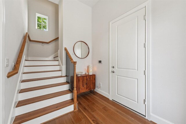 10756 Craighead Dr, Houston, TX 77025 - stairs featuring wood finished floors and baseboards