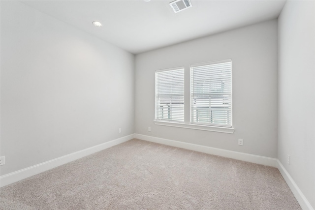 10756 Craighead Dr, Houston, TX 77025 - spare room featuring light colored carpet and baseboards