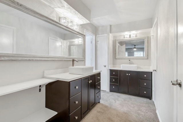 2102 Silver Moon Trl, Crosby, TX 77532 - bathroom featuring two vanities and ceiling fan