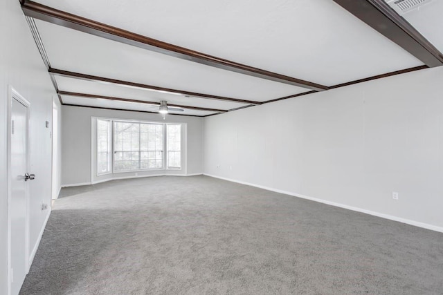 2102 Silver Moon Trl, Crosby, TX 77532 - carpeted empty room featuring baseboards and beam ceiling