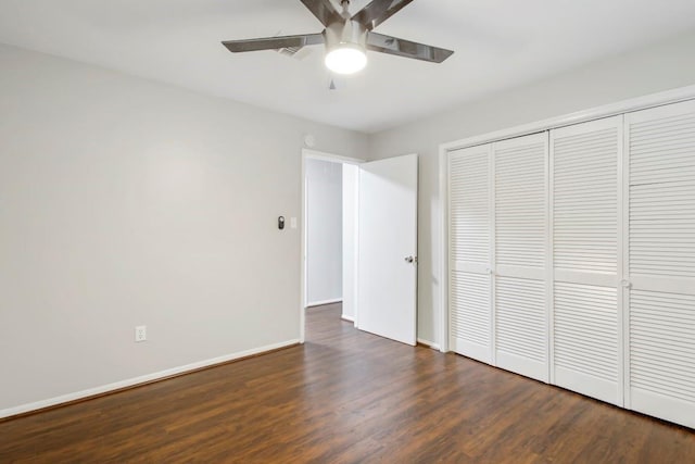 2102 Silver Moon Trl, Crosby, TX 77532 - unfurnished bedroom with wood finished floors, a closet, baseboards, and a ceiling fan