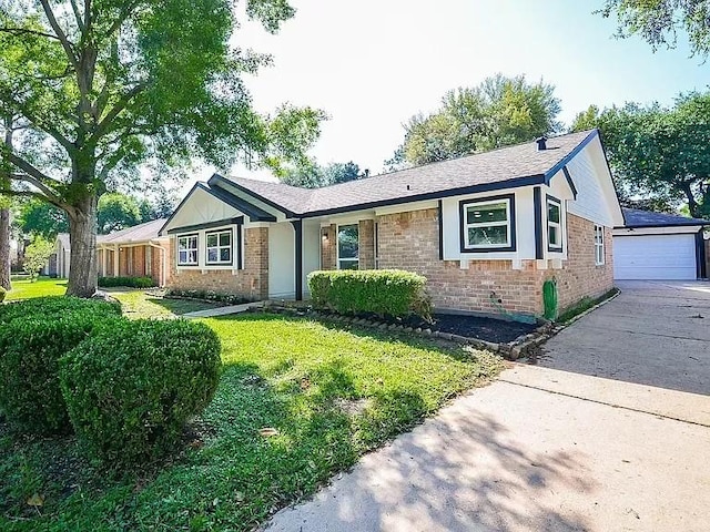 1919 Fall Meadow Dr, Missouri City, TX 77459 - single story home with brick siding, a front lawn, a garage, an outdoor structure, and a shingled roof