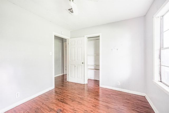 606 Roosevelt St, La Marque, TX 77568 - unfurnished bedroom featuring wood finished floors and baseboards
