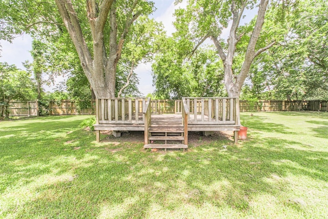 606 Roosevelt St, La Marque, TX 77568 - view of yard with a wooden deck