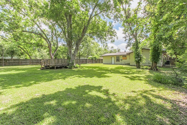 606 Roosevelt St, La Marque, TX 77568 - view of yard with a deck