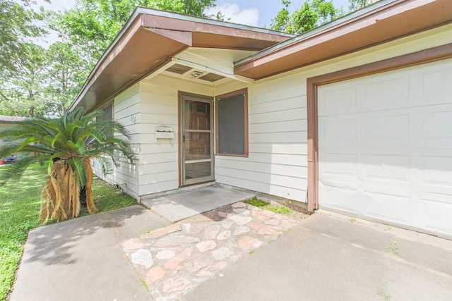 606 Roosevelt St, La Marque, TX 77568 - property entrance with an attached garage