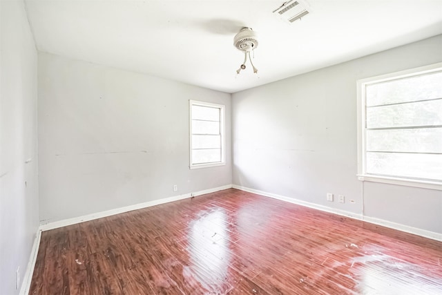 606 Roosevelt St, La Marque, TX 77568 - empty room with wood finished floors and baseboards