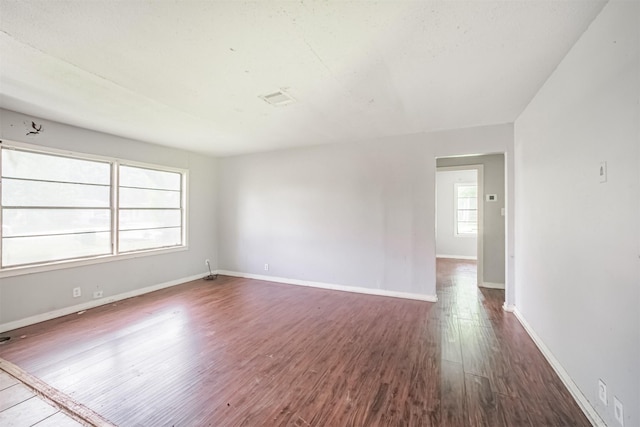 606 Roosevelt St, La Marque, TX 77568 - unfurnished room with wood finished floors and baseboards