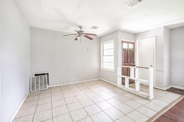 606 Roosevelt St, La Marque, TX 77568 - empty room with ceiling fan and baseboards
