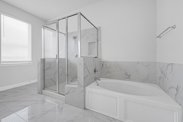 24634 Carleton Lake Ln, Tomball, TX 77375 - full bathroom featuring a bath, a marble finish shower, marble finish flooring, and baseboards