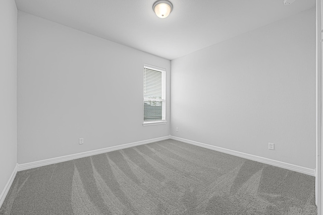 24634 Carleton Lake Ln, Tomball, TX 77375 - empty room with carpet and baseboards