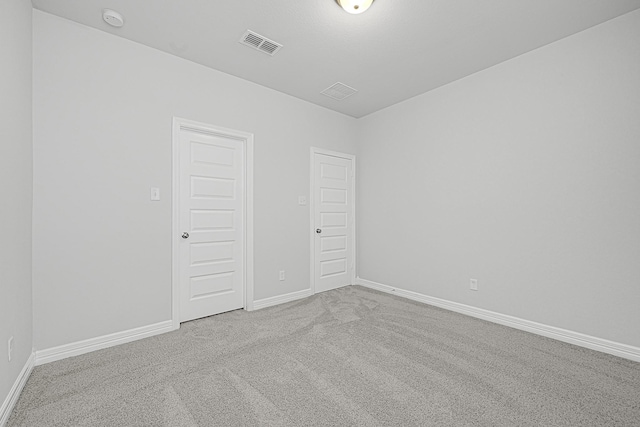 24634 Carleton Lake Ln, Tomball, TX 77375 - carpeted empty room with a smoke detector and baseboards