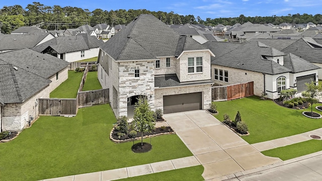 24634 Carleton Lake Ln, Tomball, TX 77375 - french country home featuring a residential view, stone siding, driveway, and a garage
