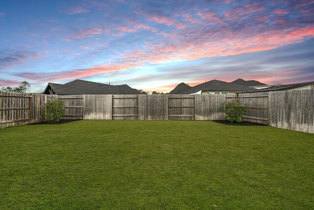 24634 Carleton Lake Ln, Tomball, TX 77375 - view of yard at dusk