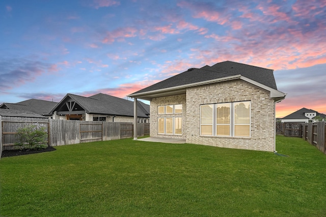 24634 Carleton Lake Ln, Tomball, TX 77375 - back of property featuring brick siding and a patio