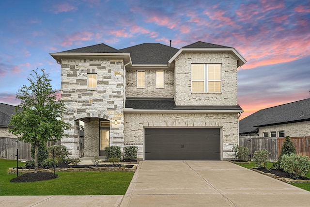 24634 Carleton Lake Ln, Tomball, TX 77375 - view of front of house featuring concrete driveway, an attached garage, roof with shingles, and brick siding