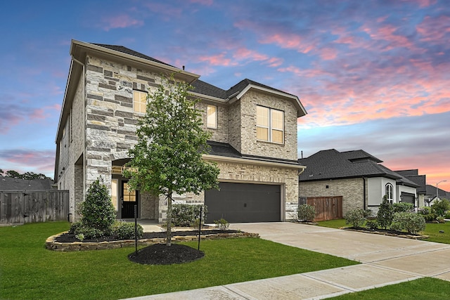 24634 Carleton Lake Ln, Tomball, TX 77375 - view of front of house featuring an attached garage, concrete driveway, and stone siding