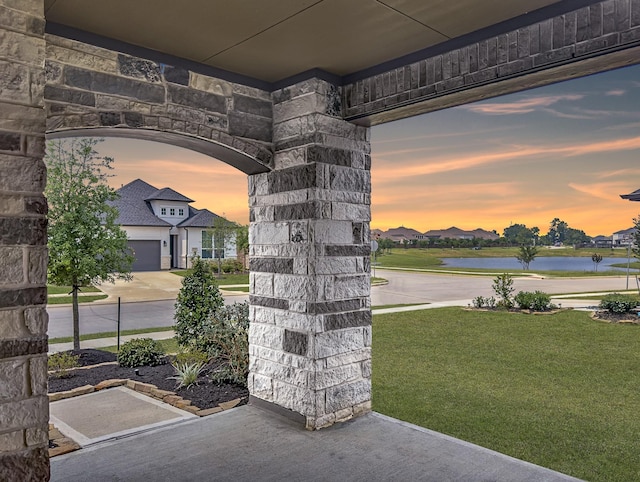 24634 Carleton Lake Ln, Tomball, TX 77375 - view of patio / terrace with a water view