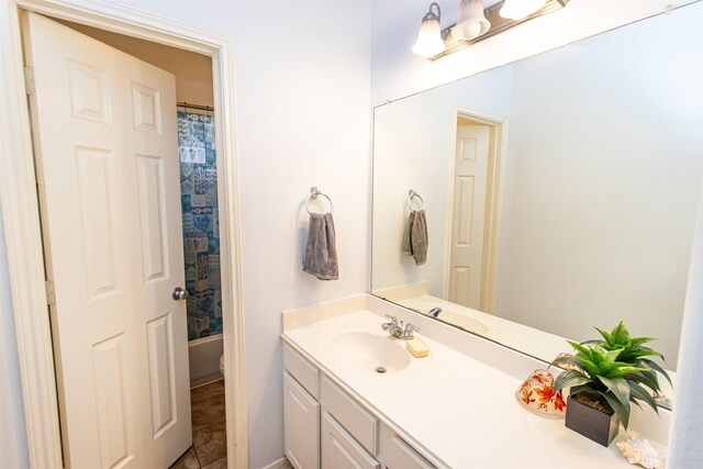 15102 Dry Ridge Ct, Humble, TX 77346 - full bathroom with vanity, toilet, and shower / bath combination with curtain