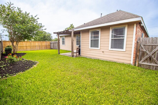 15102 Dry Ridge Ct, Humble, TX 77346 - rear view of property with a shingled roof and a patio