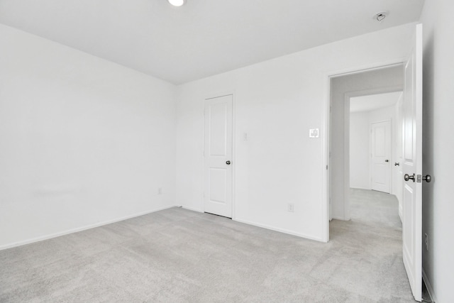 4307 Palmetto Grove Ln, Baytown, TX 77521 - unfurnished room with light colored carpet and baseboards