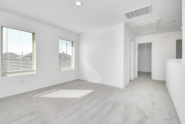 4307 Palmetto Grove Ln, Baytown, TX 77521 - carpeted empty room featuring attic access and baseboards